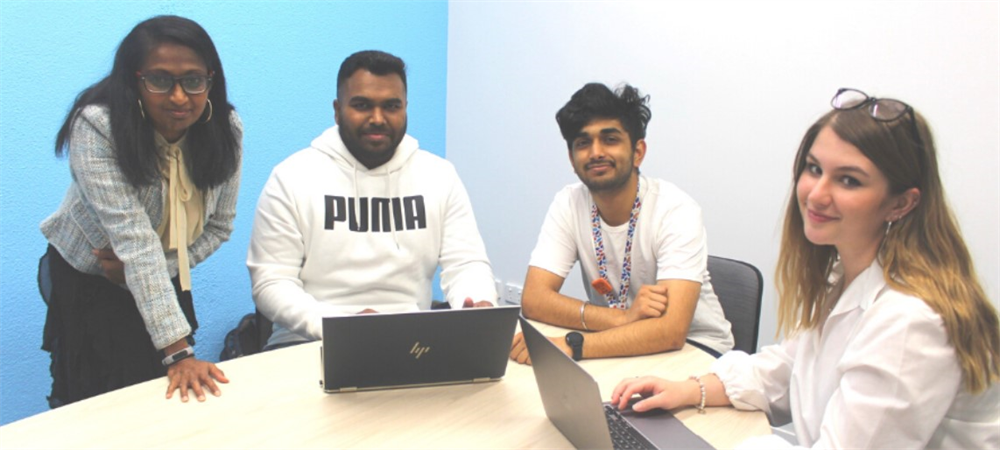 Abhi and Smit (centre L-R) have enjoyed working on a new tech project with Sonia and Erin (outside L and R) from startup, Mountoken