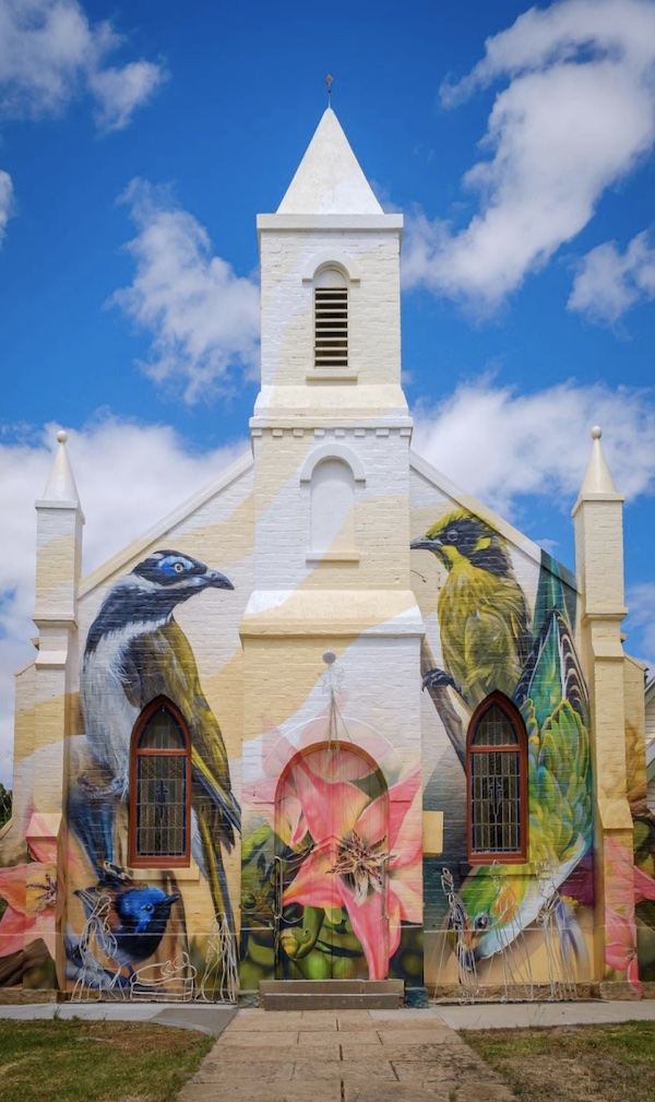 church with wall art